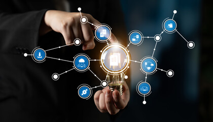 A business professional interacts with a digital interface displaying various technology icons and connections, representing data exchange and innovation in modern workplaces. Crux