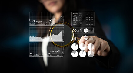 A business professional engages with advanced financial data on a digital interface, showcasing market trends and statistics in a modern workspace setting. Impute