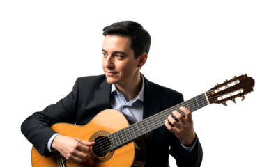 Man playing classical guitar, elegantly dressed, performs a beautiful melody with focused expression and skilled hands, showcasing his passion for music.