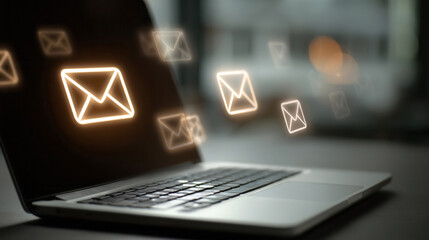 Modern laptop displays animated email notifications for seamless communication and connectivity