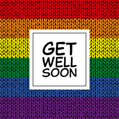 Get well soon - Schriftzug in englischer Sprache - Gute Besserung. Genesungskarte mit einem gestreiftem Strick-Hintergrund in Regenbogenfarben.