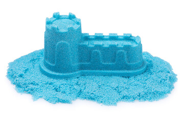 Wall with a tower made of blue kinetic sand, isolated on a white background, design element.