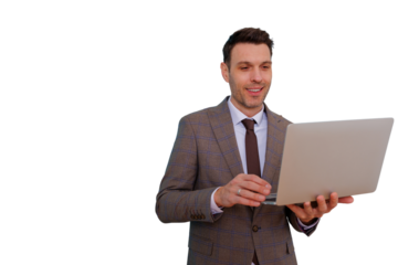Smiling businessman using laptop, engaging in remote work or online meeting, standing with a transparent background