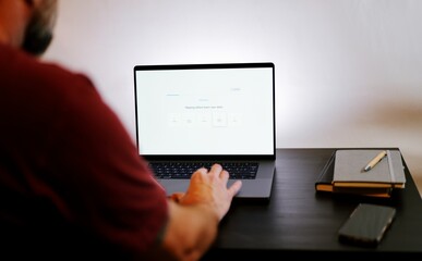 Middle Aged Man Takes Career Pathfinder Professional Assessment Tool for Occupational Suggestions Based on Personality Traits - Job Quiz Concept