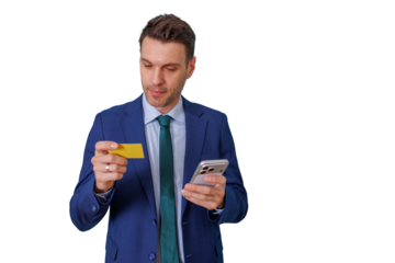 Businessman making online payment with credit card and smartphone, performing secure mobile banking transaction
