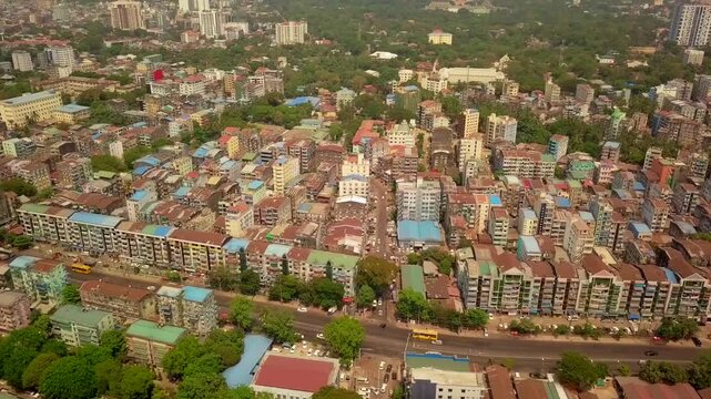  Futuristic aerial view panorama of developing Yangon city , Aerial view of Sule pagoda in downtown, Yangon, Myanmar. Sule Pagoda located in the heart of Yangon, Karaweik royal barge, Kandawgyi Lake, 