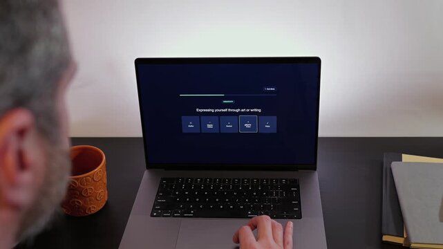 Middle Aged Man Takes Career Pathfinder Professional Assessment Tool for Occupational Suggestions Based on Personality Traits - Job Quiz Concept