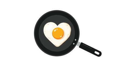 Top view of a heart shaped fried egg in a black frying pan for romantic breakfast or Valentines Day concept.