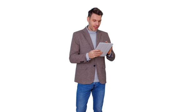 Professional man in smart casual attire using a tablet, working, and communicating with modern technology - Powered by Adobe