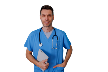 Male doctor wearing blue scrubs and stethoscope, holding a tablet and smiling, standing on a transparent background for healthcare concept