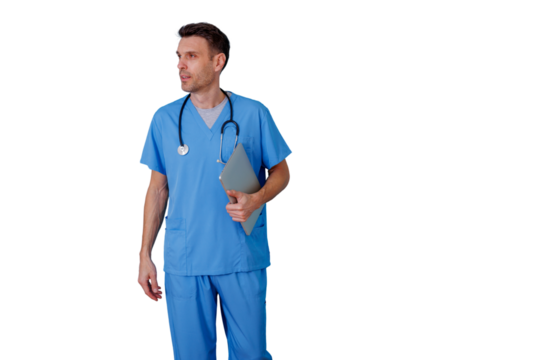 Male doctor in blue scrubs holding a digital tablet, healthcare professional looking away on transparent background - Powered by Adobe
