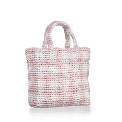 modern summer bag in white and pink raffia photographed on a white background with reflection