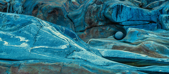 Art abstract rock background with curves, lines and colors, verzasca valley near Lavertezzo, Ticino, Switzerland