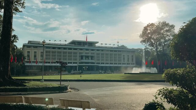 Ho Chi Minh City, Vietnam - September 18, 2025: View of the Independence or Reunification Palace, formerly Saigon. Dinh Choc Lop. A beautiful fountain sprays in front of the palace in bright daylight.
