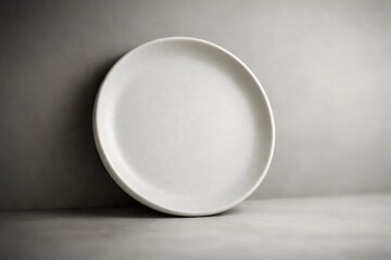 Minimal White Ceramic Plate on Neutral Surface