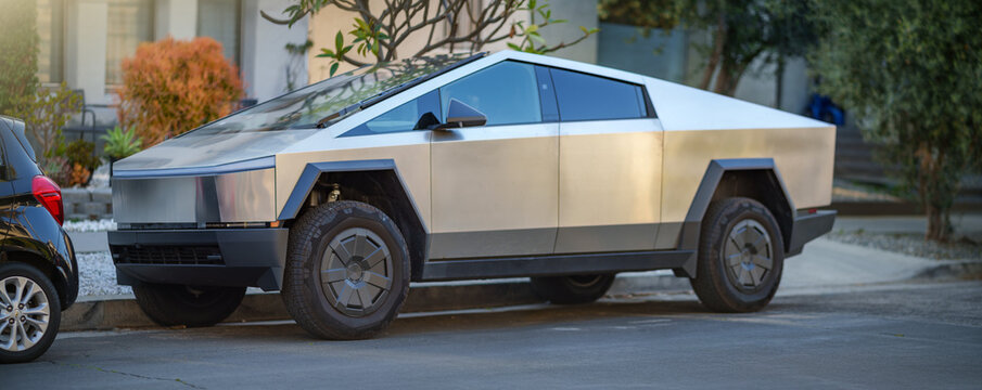 LOS ANGELES - May 2, 2025: Tesla Cybertruck electric pickup truck parked on a residential city street.