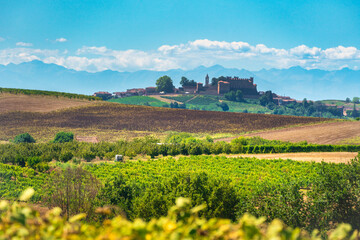 Naklejka premium Montemagno Village, Monferrato Vineyards and Alps, Italy