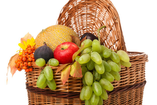 Wicker basket with different fresh fruits on white background - Powered by Adobe