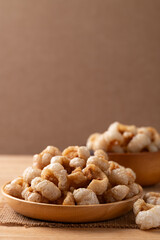Pork rind on a wooden plate, Northern Thai food