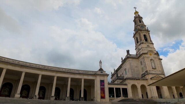 Closer architectural view of Fatima Basilica tower and facade.