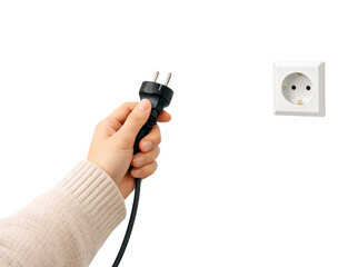 Hand Holding Power Plug Facing Wall Socket