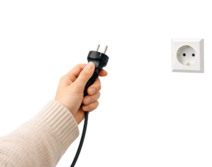 Hand Holding Power Plug Facing Wall Socket