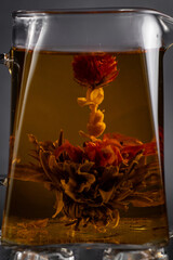 Hot tea in a cup on an old background.