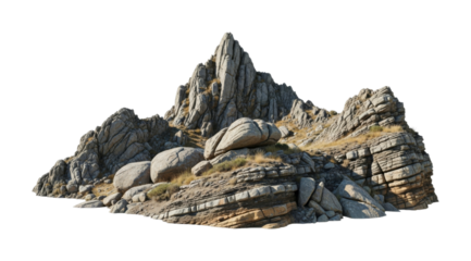 Rugged rock formation with a prominent peak and various boulders showcasing natural geological textures, stratified layers, and dry vegetation under sunlight.