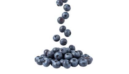 Delicious fresh blueberries falling and forming a vibrant pile, highlighting their natural sweetness, rich color, and antioxidant properties for healthy eating.