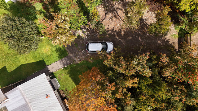 Top down aerial view of a house and car in Lenca Patagonia
