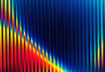Abstract close-up of a vivid rainbow gradient on a metallic striped texture with bright color reflections and dynamic diagonal arcs perfect for design projects and creative layouts