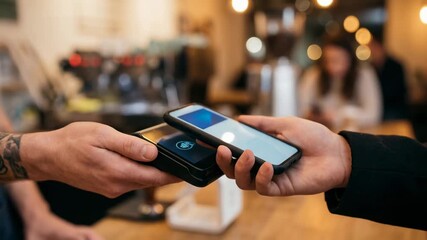  Instant payment NFC concept. Instant payment NFC technology urban cafe setting modern lifestyle culture reflects instant payment NFC technology urban cafe setting modern - Powered by Adobe