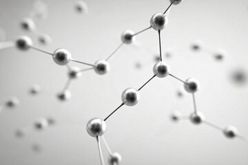 Obraz premium A close-up view of molecular structure showcasing interconnected spheres and bonds on a light background.