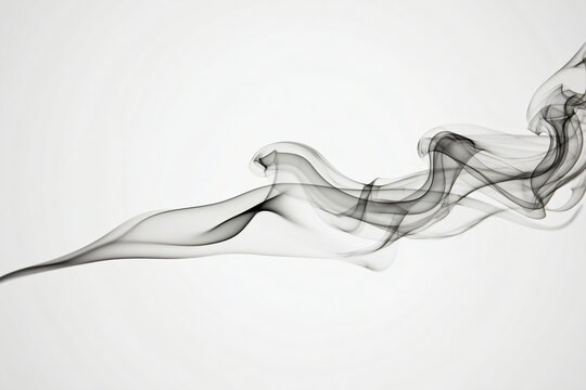 A graceful swirl of black smoke on a white background, creating an abstract and ethereal effect.