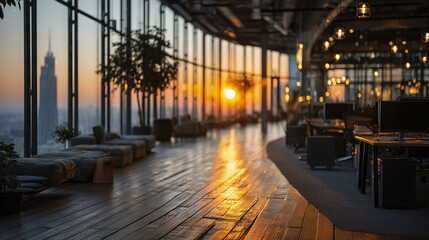 Modern office interior with wooden floor and large windows showing city skyline at sunset, warm light creating cozy and calm atmosphere in workspace