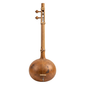 A detailed view of a traditional wooden string instrument.
