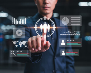 Man touching holographic screen with target audience analytics