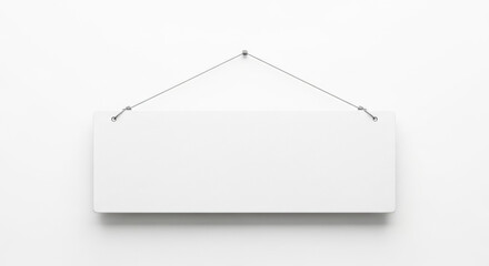 Naklejka premium A clean white rectangular signage hangs centered on a textured white wall, ready for advertising. The simple design offers ample copy space.