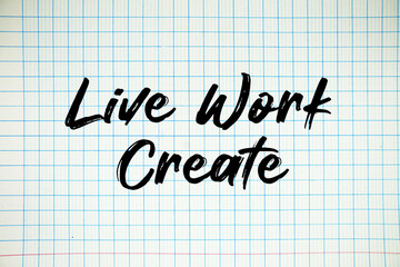 Live Work Create text written on white notebook sheet with grid