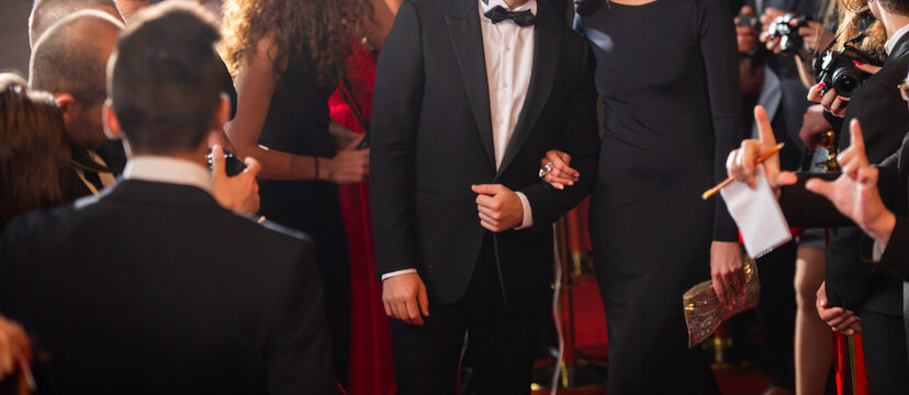 blurred background with red carpet and celebrities