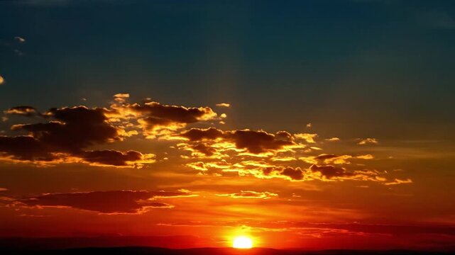 Glorious sunset transforms the horizon into a canvas of radiant colors and striking cloud patterns