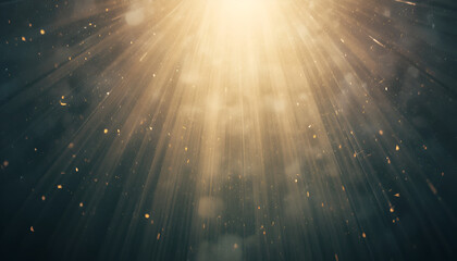 Golden light rays shining through dark background with sparkles