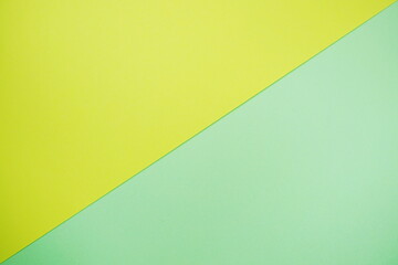 A minimal abstract image featuring intersecting geometric triangles in soft pastel color
