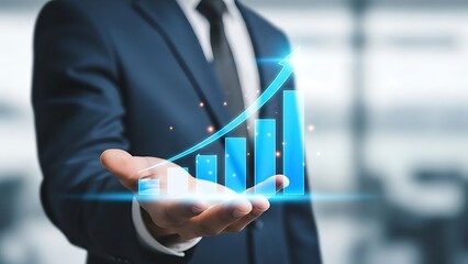 Businessman presenting blue glowing bar chart with rising graph line suit hand