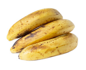 Fresh ripe bananas with natural brown spots isolated on white background, minimal food composition.