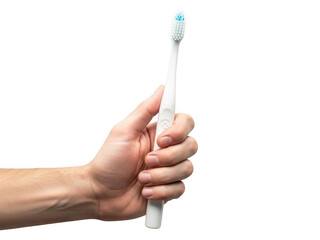 A hand holding a white toothbrush isolated on transparent background