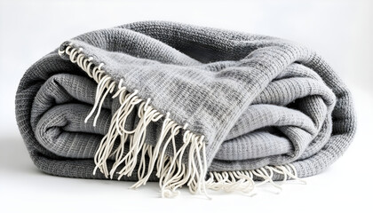 A gray blanket with white fringes on it