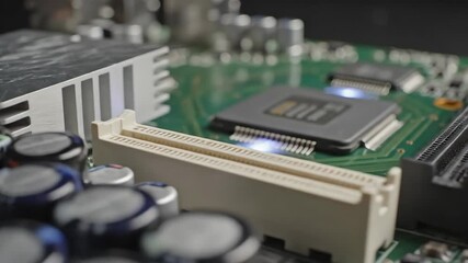 Detailed closeup view of a modern computer circuit board showcasing intricate electronic components microchips and a heatsink representing advanced technology digital processing and the core of compu. - Powered by Adobe