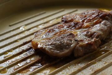 meat steak grill on pan in the kitchen