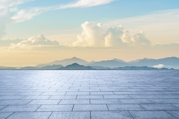 Empty square floor and beautiful mountain landscape under cloudy sky
